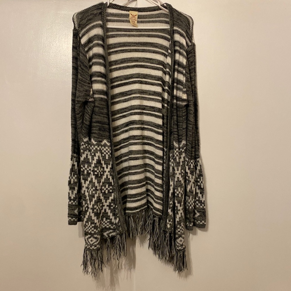 Black, gray, and white cardigan